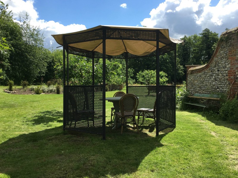 The grounds at West Lexham are beautiful and vast. There's always somewhere to sit for lunch, and shelter from rain or sun, even when the main kitchen table is occupied. These pagodas were a pretty place to play a game or eat a snack.