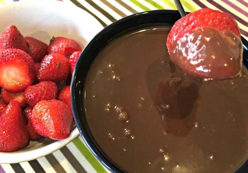 Easy strawberry recipes: this chocolate fondue dip is always a hit with kids, and is so quick to make